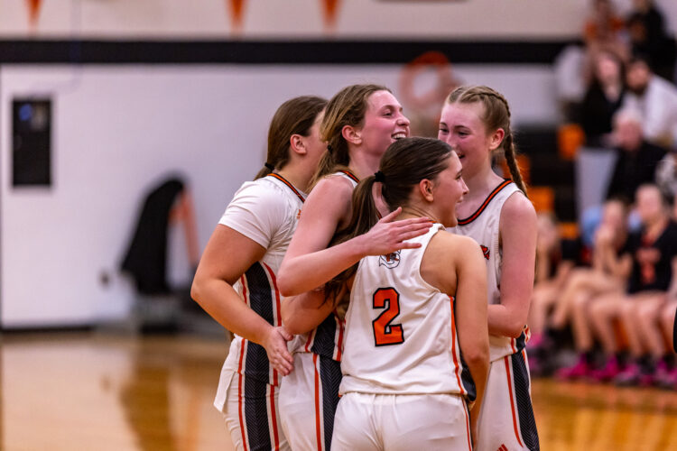 Tsoras Reaches 1,000, Tigers Reach Next Round With Win Over Trojans